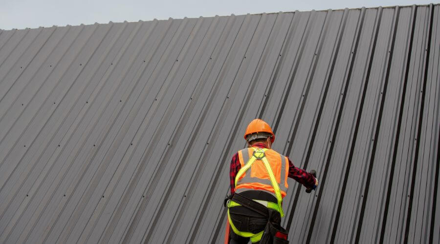 Professional metal roof installation services in Parsons, KS
